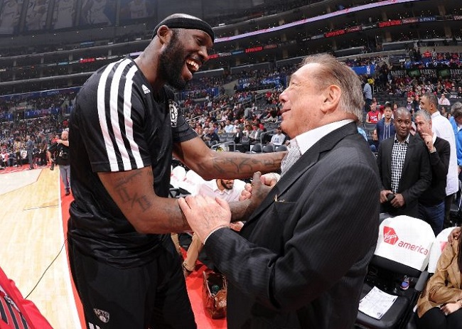 Clippers owner Donald Sterling (r) with former Clipper and current Kings PF Reggie Evans.