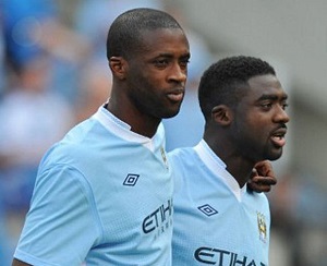 Yaya (left) and Kolo Toure with Manchester City.