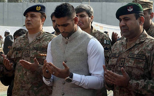 Amir Khan visited Peshawar, Pakistan, school on Dec. 29, 2014.