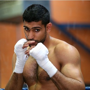 Amir Khan is 30-3 as a pro with 19 knockouts.