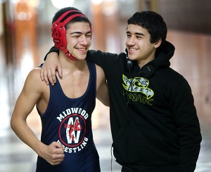 High school wrestlers and brothers Jahongir (left) and Jonibek Davronov.