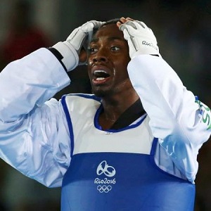 Lutalo Muhammad of Great Britain reacts to losing in the gold-medal match.