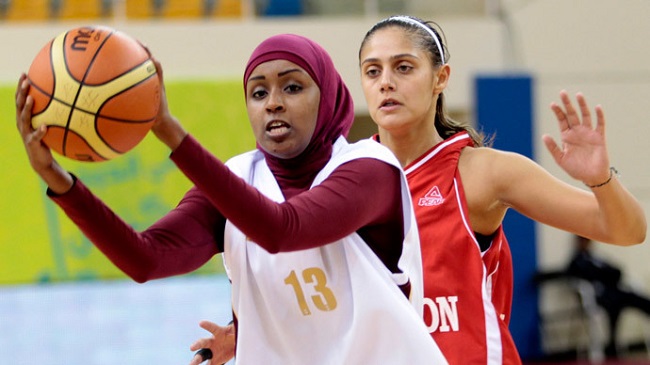 Amel Saleh (No. 13) of the Qatari women's national basketball team.